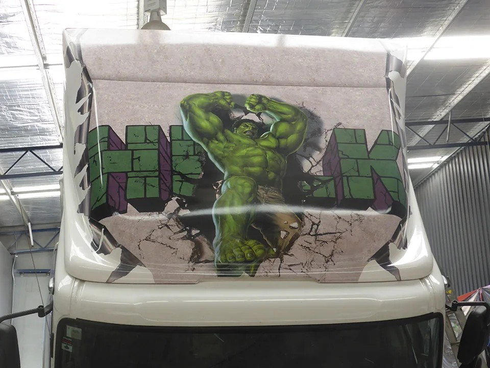 Custom truck air-deflector wrap and signage by BENHER